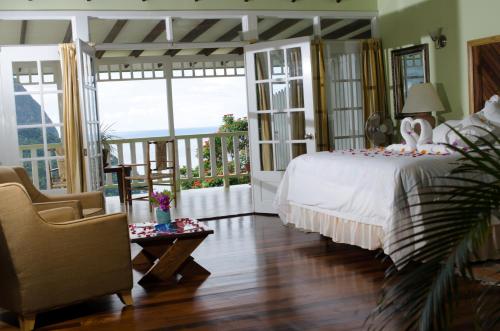 Ein Bett oder Betten in einem Zimmer der Unterkunft La Haut Resort