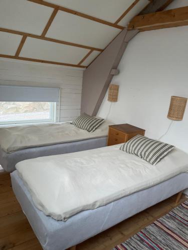 En eller flere senge i et værelse på Fjällbacka, Karlshed Gård