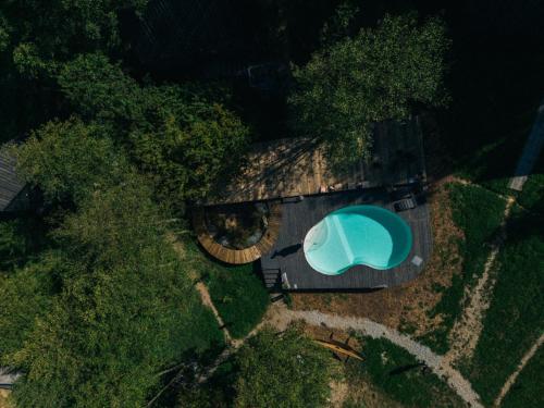 an overhead view of a swimming pool in a yard at PORTAL Village Only Adults in Sibiel