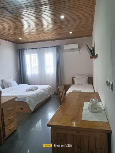 Giường trong phòng chung tại Les Chalets du Voyageur