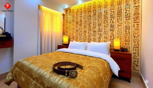 En eller flere senge i et værelse på PYramiDs MaGiC EyE HoTeL