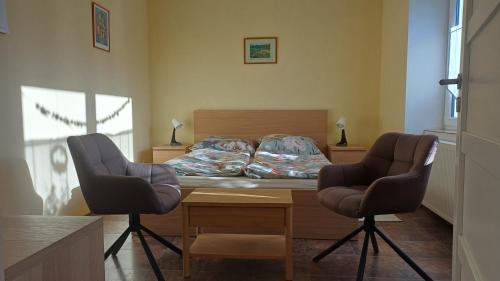 Postel nebo postele na pokoji v ubytování Apartmán Pod Parkem