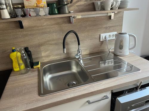 Kuchyň nebo kuchyňský kout v ubytování Triglav NP Apartment - above Bled