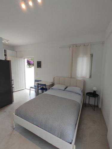 Postel nebo postele na pokoji v ubytování Aurora Galini - Aqua Serenity Stay