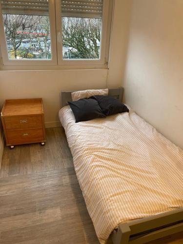 Postel nebo postele na pokoji v ubytování Appartement 2 chambres lumineux à 10 minutes de Paris