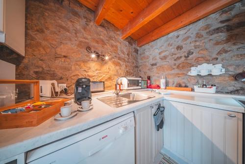 Køkken eller tekøkken på La Ferme Des Astres