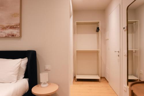 Letto o letti in una camera di Garden Studio Double Suite - Bernina Experience