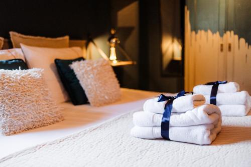 En eller flere senge i et værelse på Boutique vakantiehuis Het Stalhuys