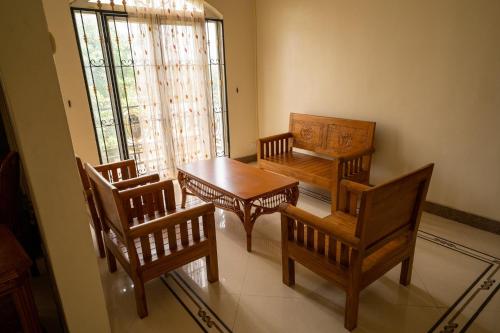 Khu vực ghế ngồi tại Beachside Apartments Pointe aux Piments