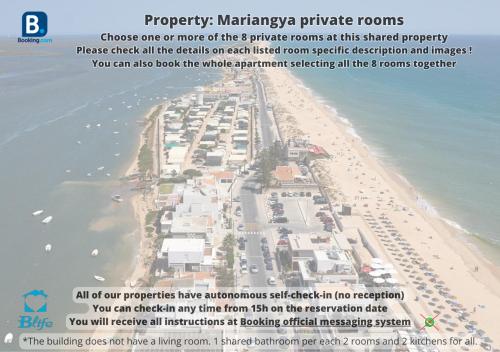 a map of a beach with a bunch of buildings at Blife Mariangya private rooms at Faro beach in Faro