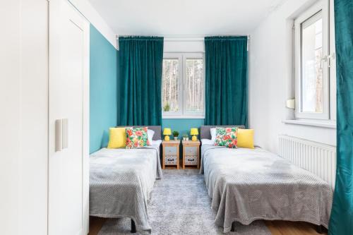 Postel nebo postele na pokoji v ubytování Dom Rooms of Poland - 500m od Suntago