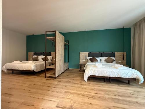 Postel nebo postele na pokoji v ubytování Luxury Rooms San Lorenzo