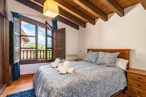 En eller flere senge i et værelse på La Campanona