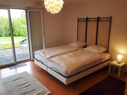 Postel nebo postele na pokoji v ubytování Pause cocooning - wifi - parking