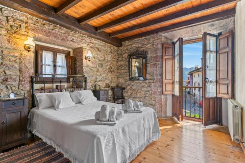 En eller flere senge i et værelse på La Breval