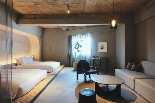 Ένα ή περισσότερα κρεβάτια σε δωμάτιο στο Korinkyo