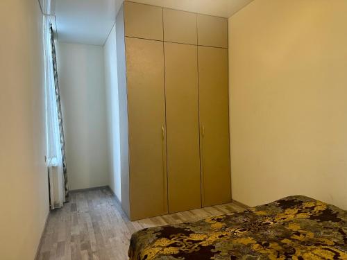 Postel nebo postele na pokoji v ubytování Kristi's Apartament