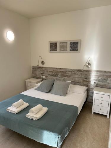 Postel nebo postele na pokoji v ubytování Apartamentos ELMA1