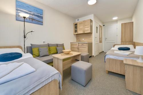 Ένα ή περισσότερα κρεβάτια σε δωμάτιο στο Dom Gościnny Matex