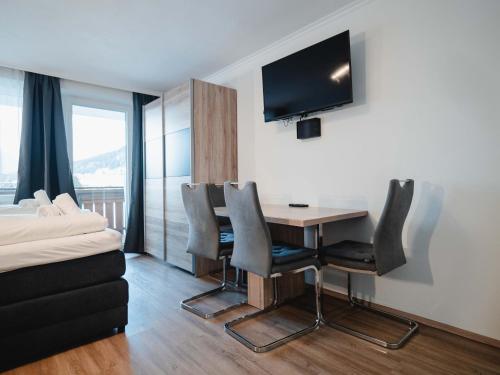 TV a/nebo společenská místnost v ubytování ApartmentAvenue