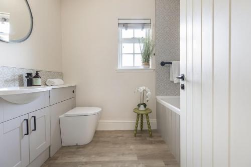 Et badeværelse på Honeysuckle Cottage, Kailzie