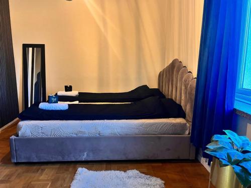 Postel nebo postele na pokoji v ubytování Top floor Helsfyr city central apartment