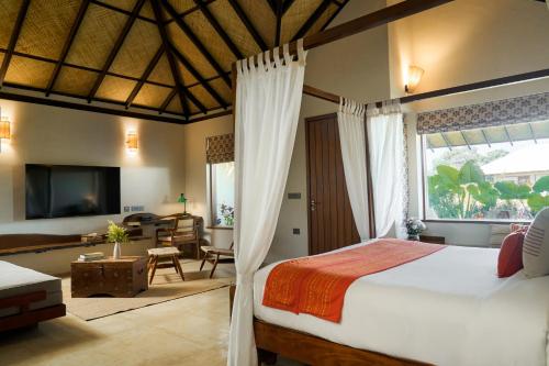 En eller flere senge i et værelse på Shambhala