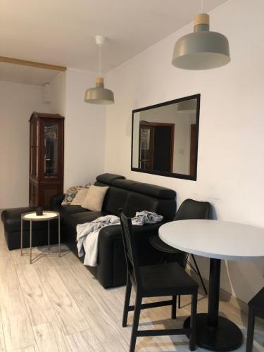 Posezení v ubytování Apartament Cozy Studio