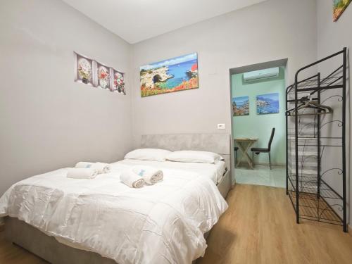 Postel nebo postele na pokoji v ubytování Dal Monsingore