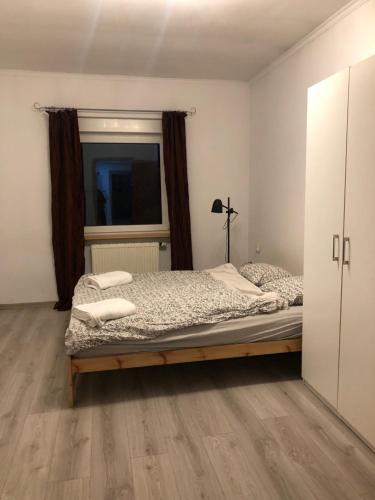 Postel nebo postele na pokoji v ubytování Apartament Cozy Studio