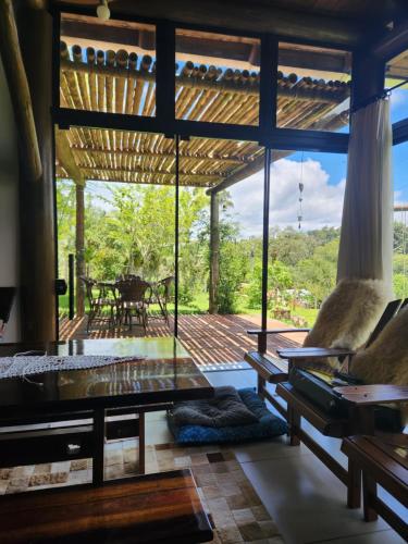 Et opholdsområde på Chalé manacá da Serra