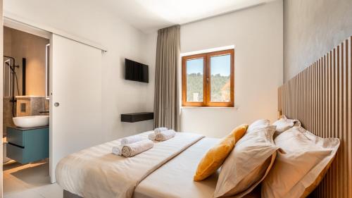 En eller flere senge i et værelse på Villa Brig by Villas Guide