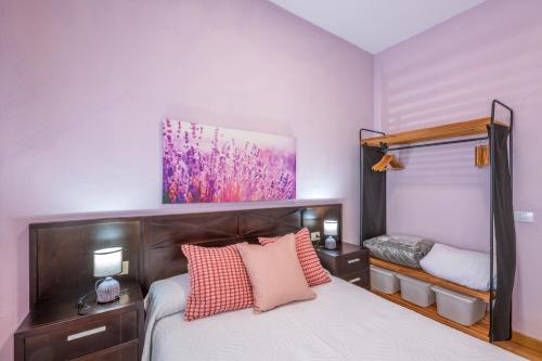 En eller flere senge i et værelse på Casa Los Duraznos