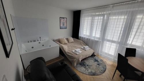 Posezení v ubytování Hermes Sauna Jacuzzi