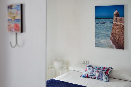 Ένα ή περισσότερα κρεβάτια σε δωμάτιο στο Spanish Galleon Lodge