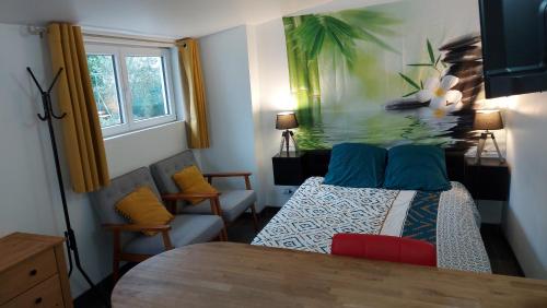 Et opholdsområde på Le bon coin jardin acces autonomie parking privé