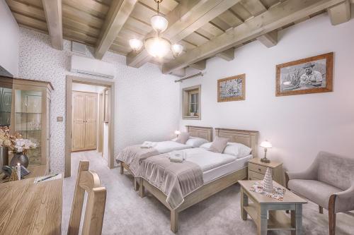 En eller flere senge i et værelse på Hotel U dobrého pastiera