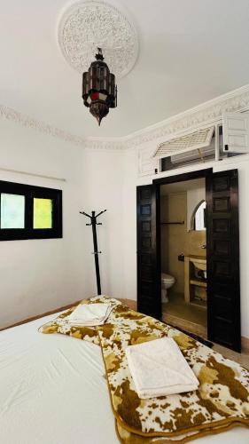 Llit o llits en una habitació de Riad 46