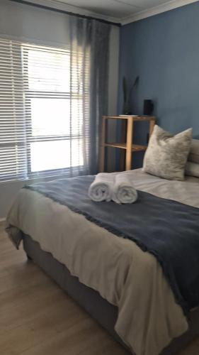 En eller flere senge i et værelse på The Islands on Capri