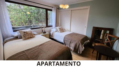 Ένα ή περισσότερα κρεβάτια σε δωμάτιο στο Cabañas Renova