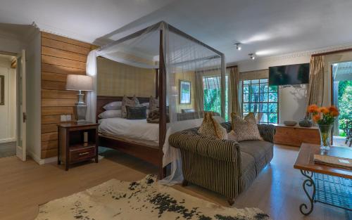 Postel nebo postele na pokoji v ubytování Silvermist Organic Wine Estate