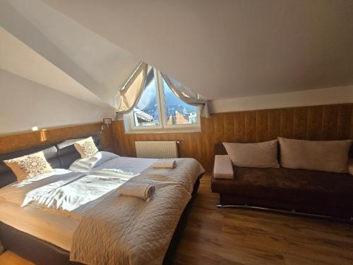 En eller flere senge i et værelse på Aspen