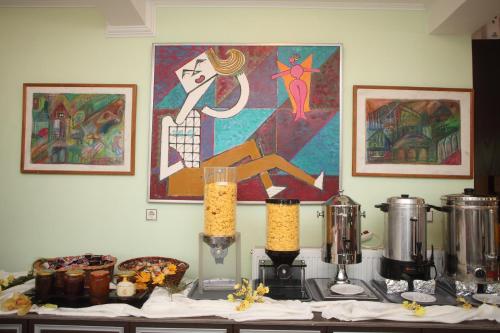 a counter top with some food on top at Hotel Pegasos in Nikiana