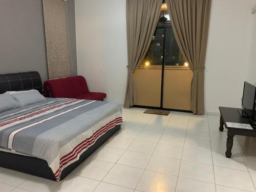 Billede fra billedgalleriet på Woon homestay 2 i Balik Pulau