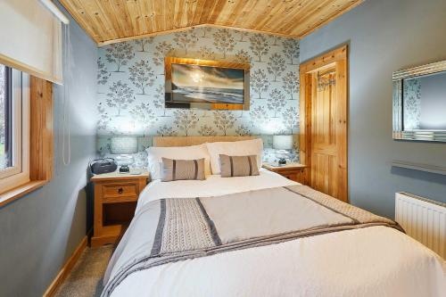 En eller flere senge i et værelse på Host & Stay - Cairnswood Lodge