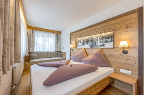 Ένα ή περισσότερα κρεβάτια σε δωμάτιο στο Apartmenthaus Goldeck