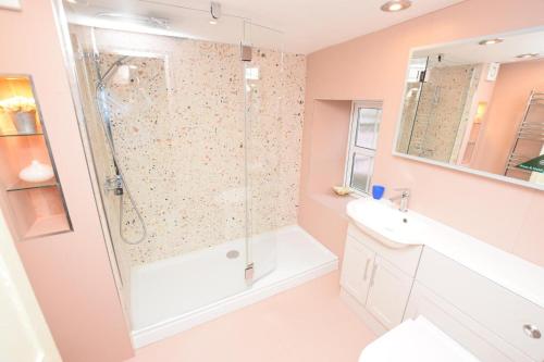 a bathroom with a shower and a sink at 2 Bed in Mumbles oc-hh133 in The Mumbles