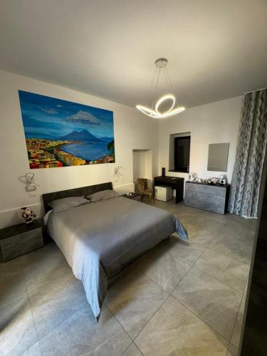 En eller flere senge i et værelse på Pompei Comfort Room