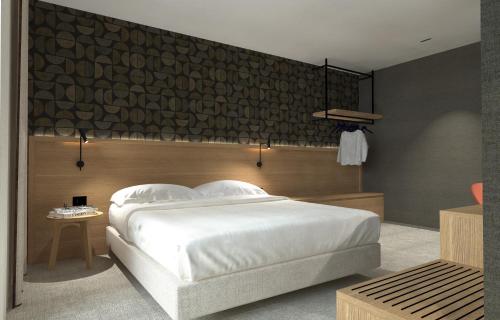 Giường trong phòng chung tại Il Leon D'Oro Hotel Bari