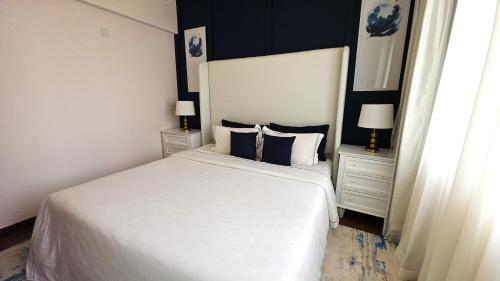 En eller flere senge i et værelse på Bentley Luxury Suite - ON320 Colombo 02